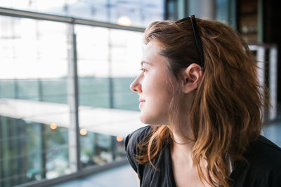 Close-up of young woman at airport