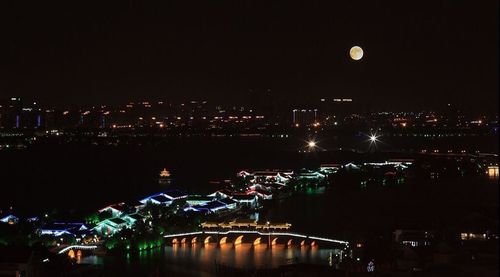 Illuminated cityscape at night