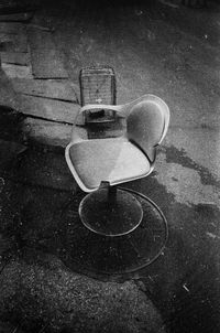 High angle view of old shoe on street