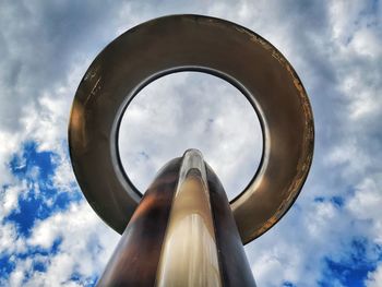 Low angle view of sculpture against sky