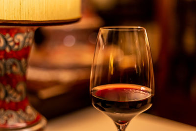 Close-up of wine glass on table