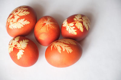 Close-up of easter eggs against white background