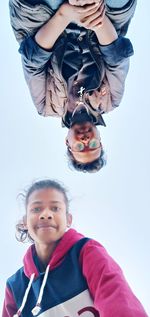 Low angle portrait of smiling boy