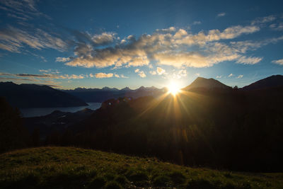 Scenic view of mountains against sky during sunset