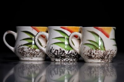 Close-up of coffee served on table