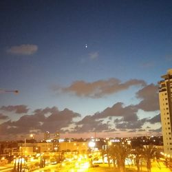 Illuminated cityscape at night