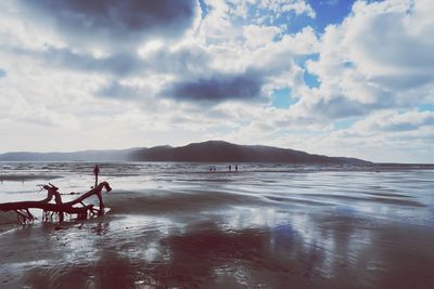 Scenic view of beach against sky