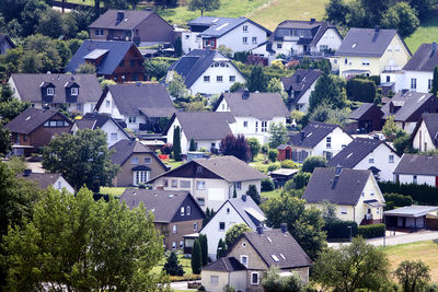 Aerial view of family houses at the edge of a village in the country in germany