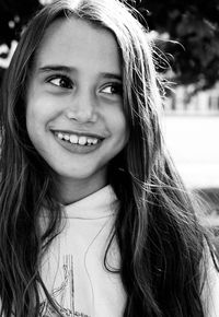 Close-up portrait of a smiling girl