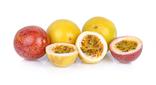 Close-up of fruits against white background