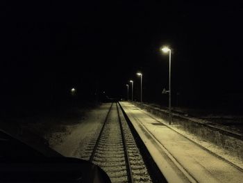 Illuminated street lights at night