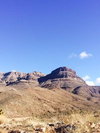 Landscape with mountain range in background