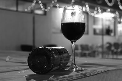 Close-up of wine in glass on table