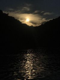 Scenic view of sea against sky at sunset