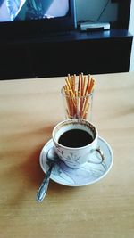 Coffee cup on table