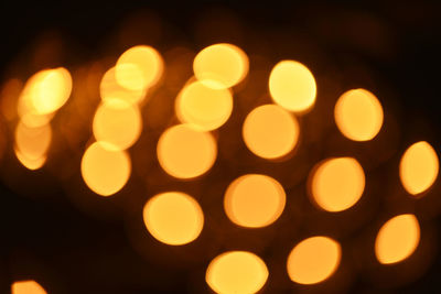 Defocused image of illuminated light bulb