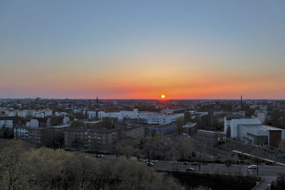 High angle view of townscape against sky during sunset