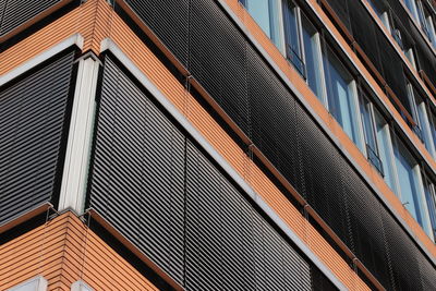 Low angle view of modern building against sky