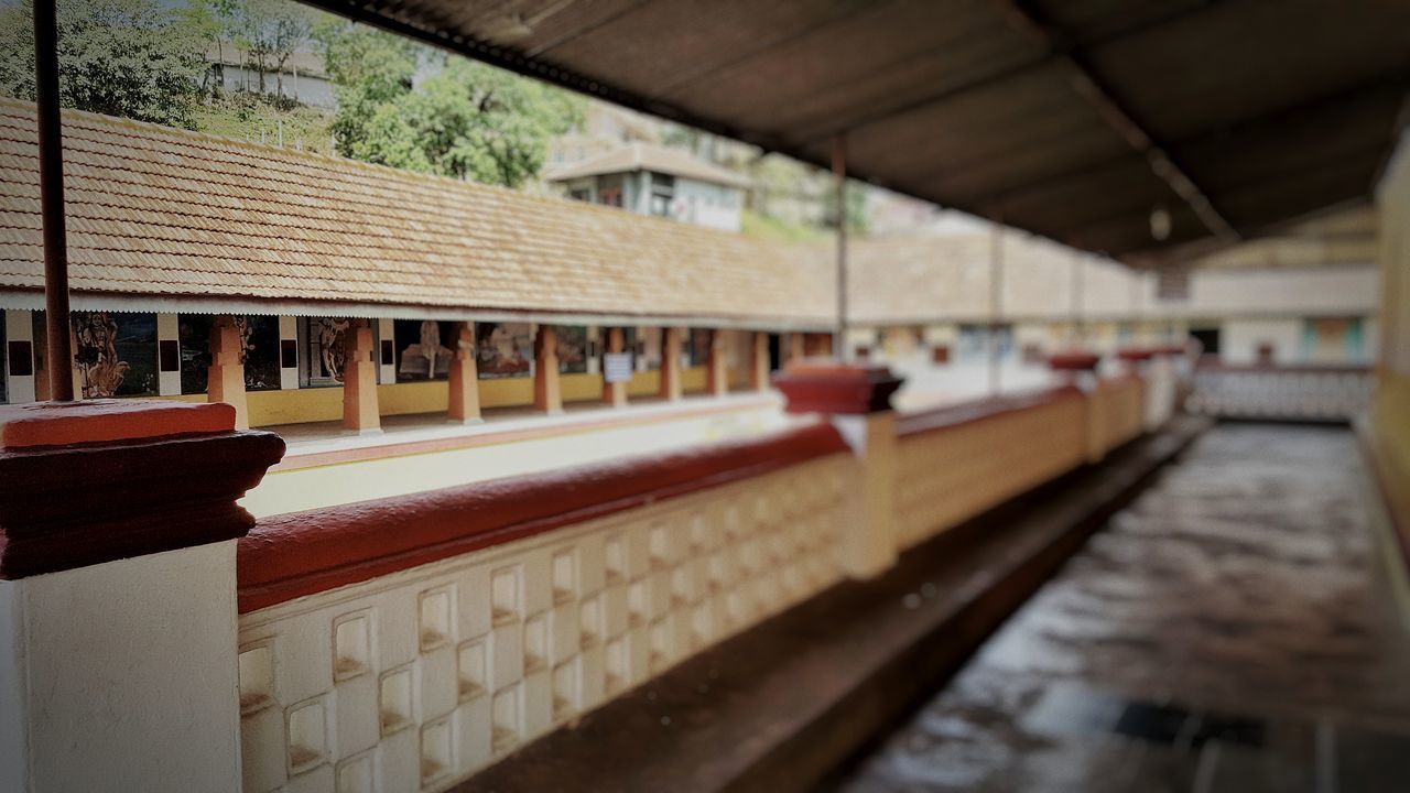 VIEW OF RAILROAD STATION PLATFORM IN BUILDING