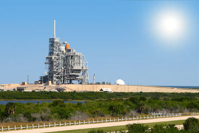 View of temple against clear blue sky