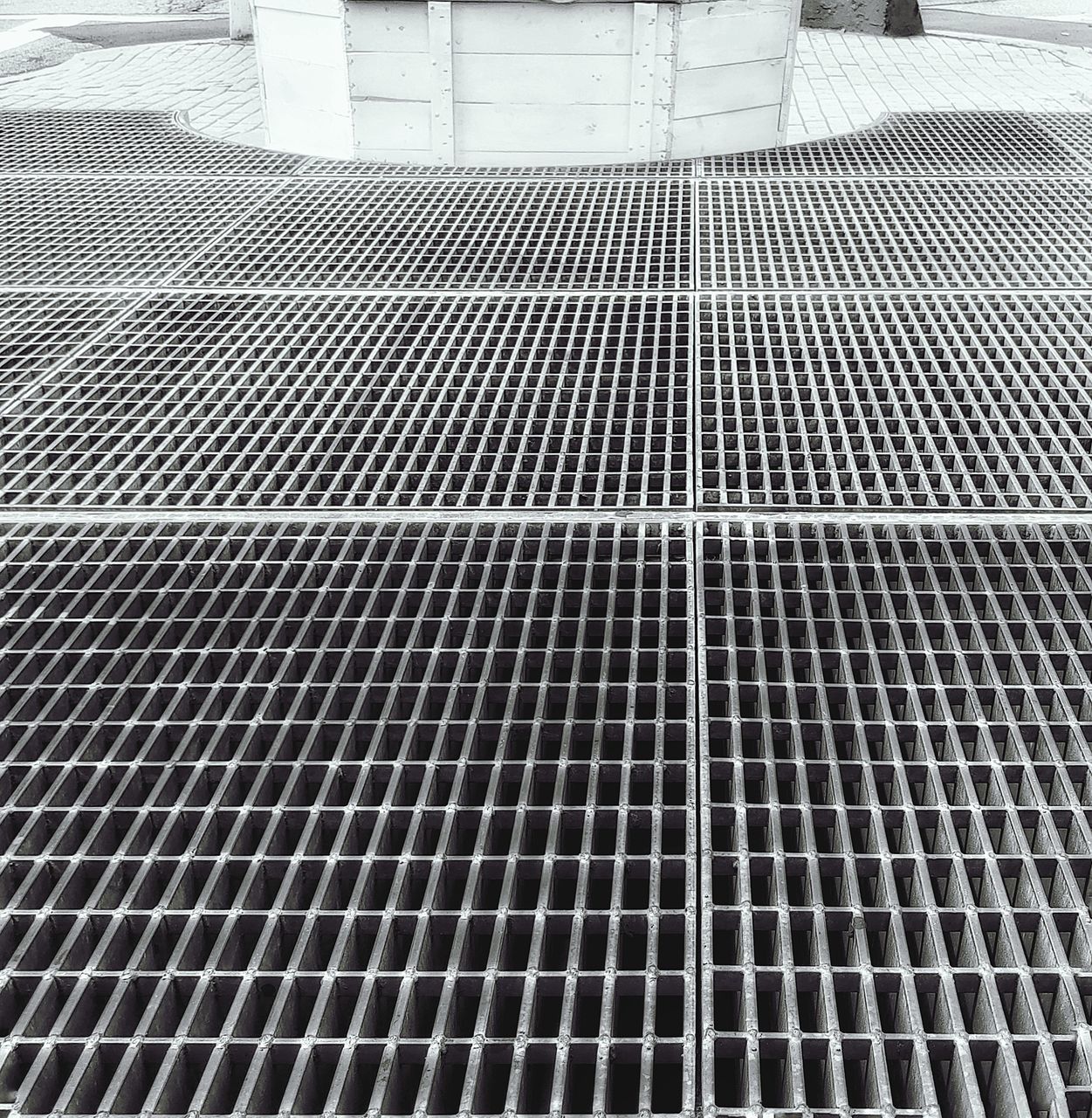 FULL FRAME SHOT OF METAL GRATE BUILDING