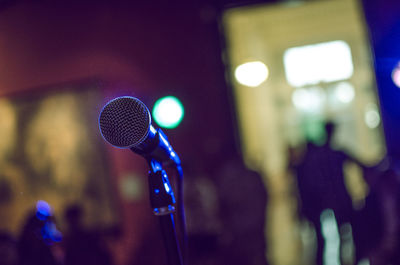 Close-up of microphone in nightclub