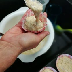 Close-up of hand holding ice cream