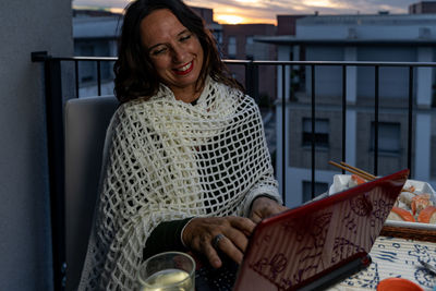 Young woman using digital tablet