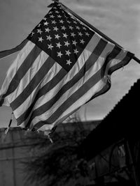 Close-up of flag against sky