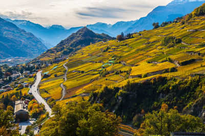 High angle view of trees and mountains against sky