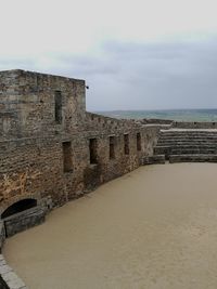 View of fort against cloudy sky
