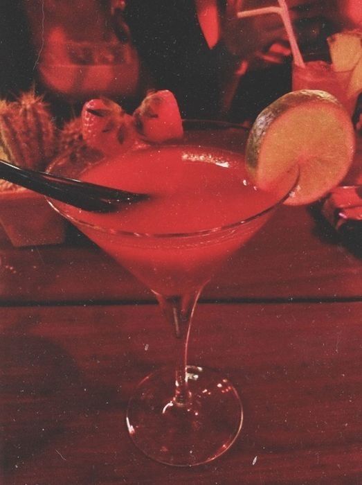 table, red, indoors, drink, drinking glass, freshness, food and drink, refreshment, glass - material, close-up, still life, transparent, wineglass, pink color, wood - material, focus on foreground, alcohol, drinking straw, cocktail, water