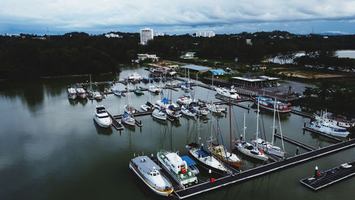 High angle view of boats moored at harbor