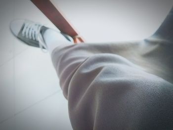 High angle view of man relaxing on floor at home