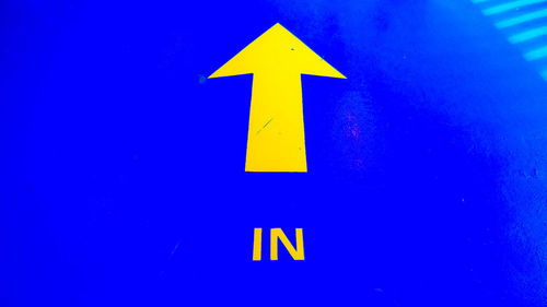Close-up of yellow sign
