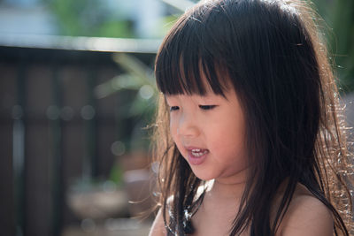 Close-up of innocent girl with long hair