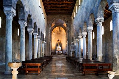 Empty benches in the church