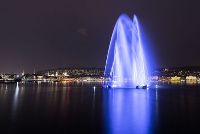 Panoramic view of illuminated city at night