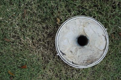 High angle view of hole on field