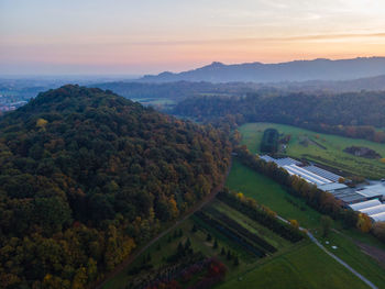 High angle view of landscape against sky during sunset