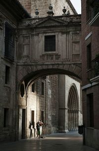 Full length of people walking in building