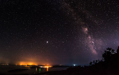 Low angle view of star field against sky at night