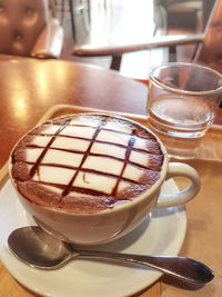 Close-up of coffee cup on table