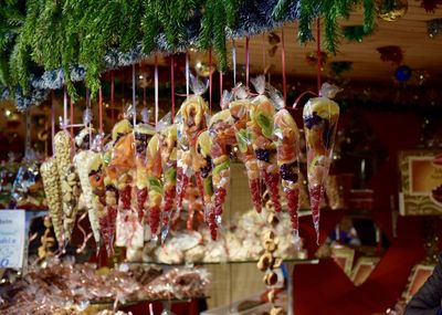 Close-up of dried fruits hanging for sale