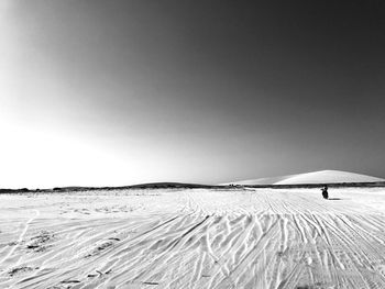 Scenic view of desert against clear sky