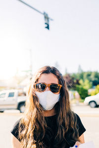 Portrait of young woman in sunglasses