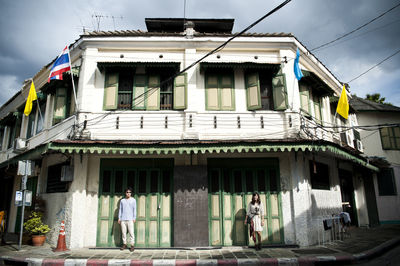 People in front of building