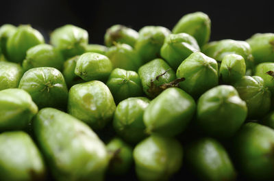 Close-up of green chili peppers