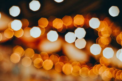 Defocused image of illuminated lights at night