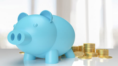 Close-up of coins on table
